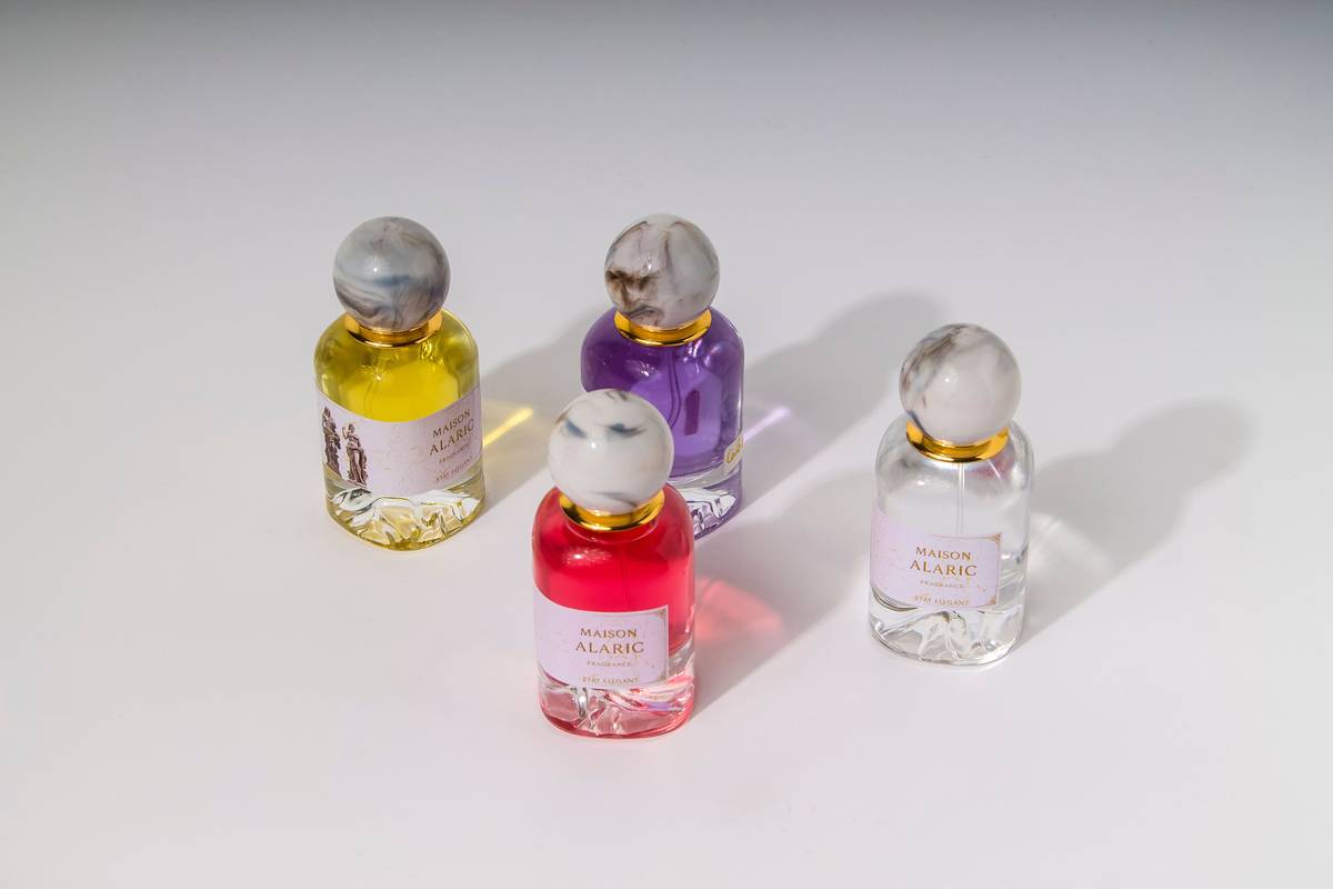 pads for essential oil smells on a marble surface with lavender and eucalyptus bottles nearby